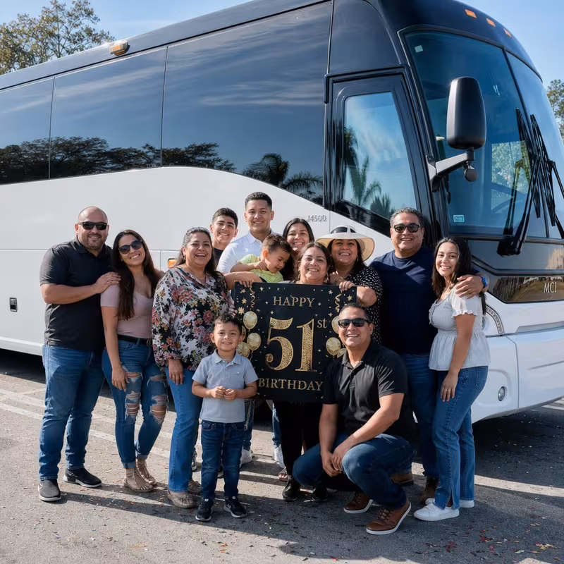 Passengers loading luggage while boarding an Miami group shuttle