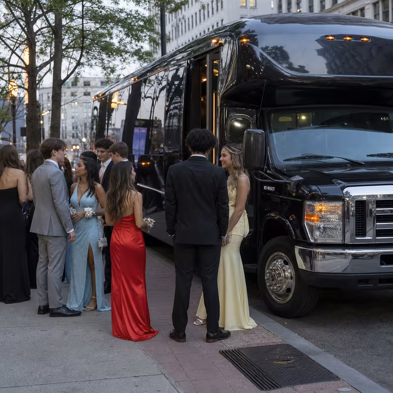 Passengers loading luggage while boarding an Miami group shuttle
